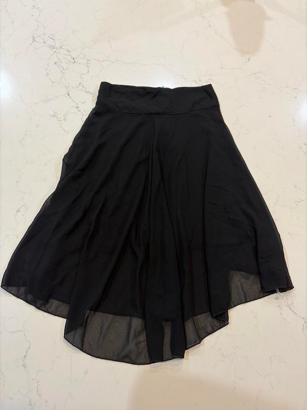 Black midi skirt with sheer overlay